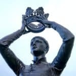 statue holding crown